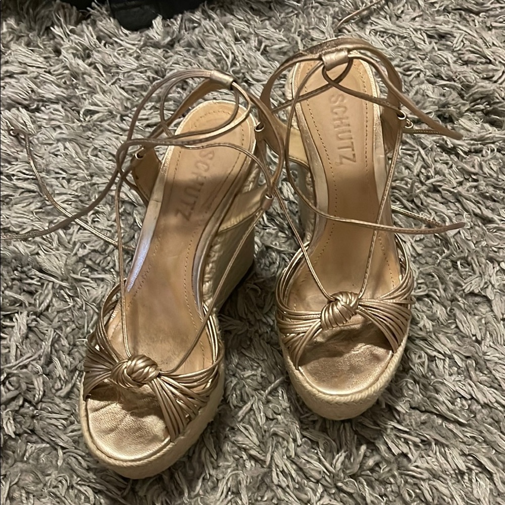 Schutz Gold Platform Shoes with Strappy Design